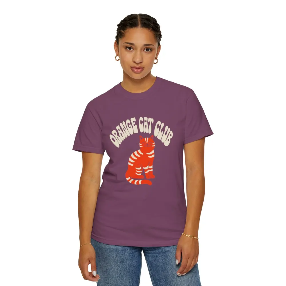 Model wearing the Orange cat club tee in Burgundy